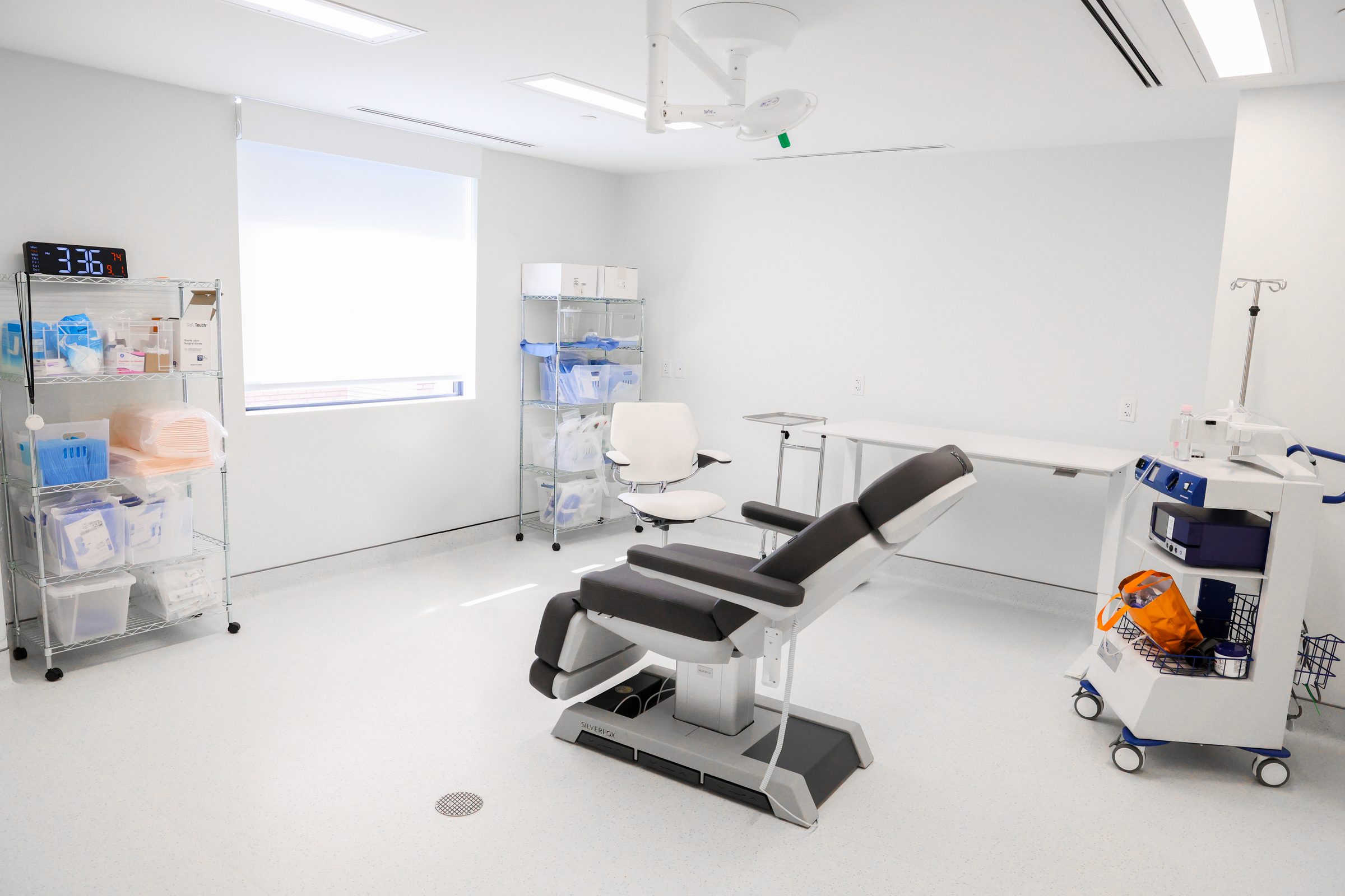 OR 1 at Capital Surgical Center: procedure chair and overhead surgical light